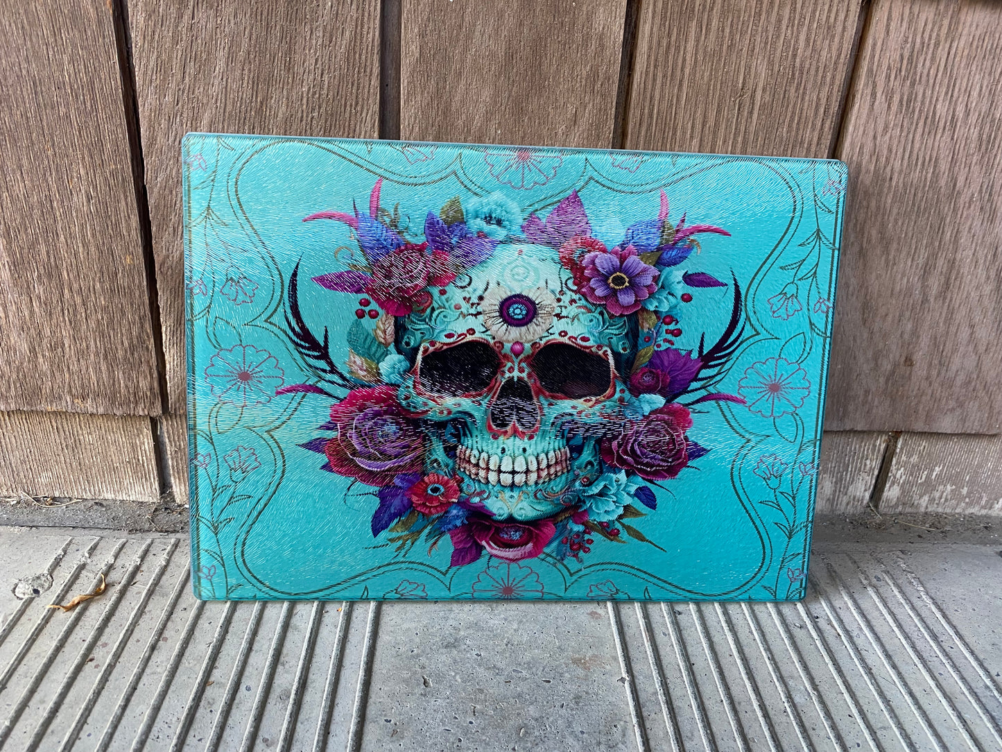 Sugar skull teal cutting board