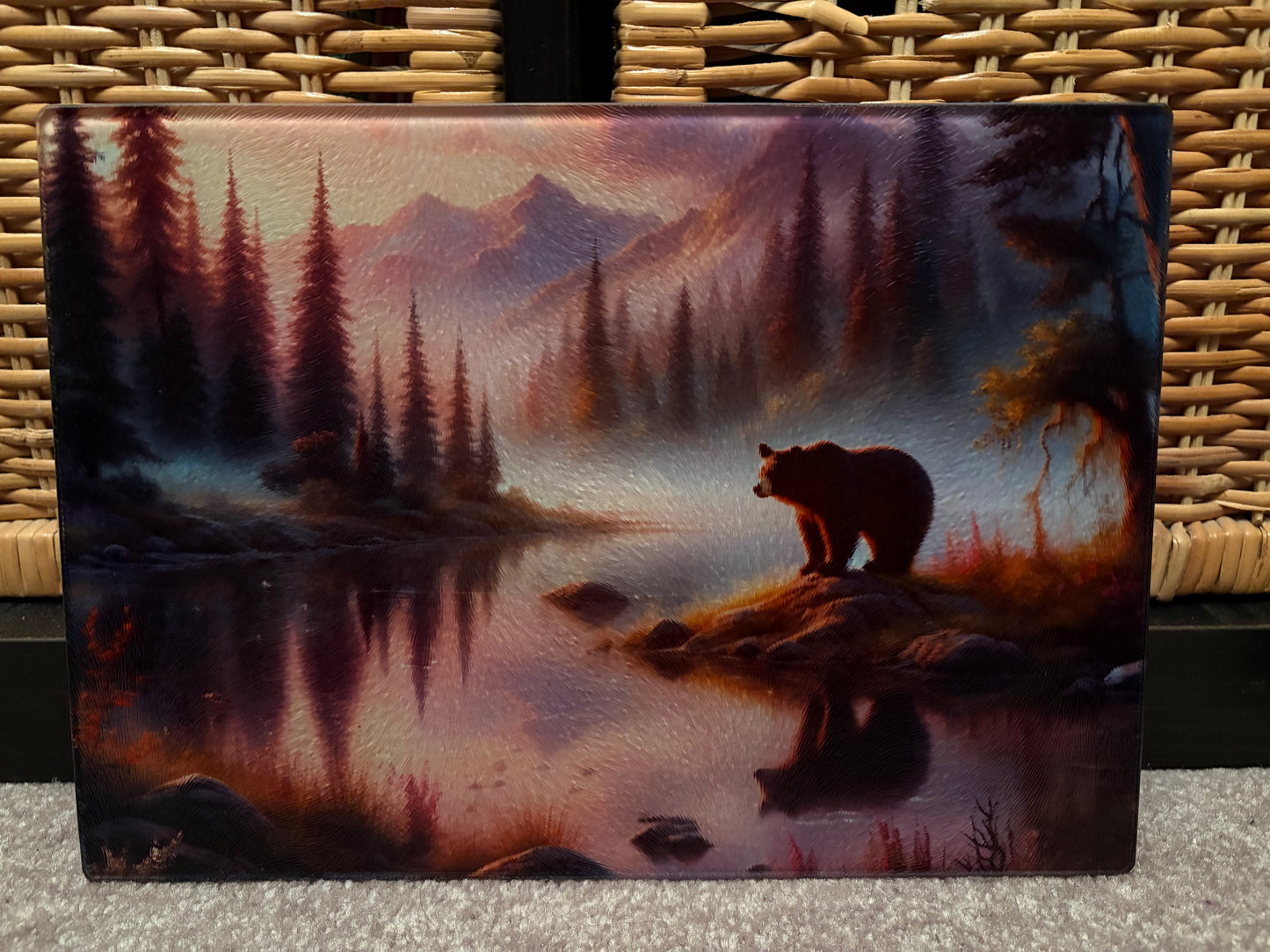 Bear in the misty lake with mountains