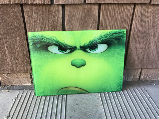 Green face cutting board