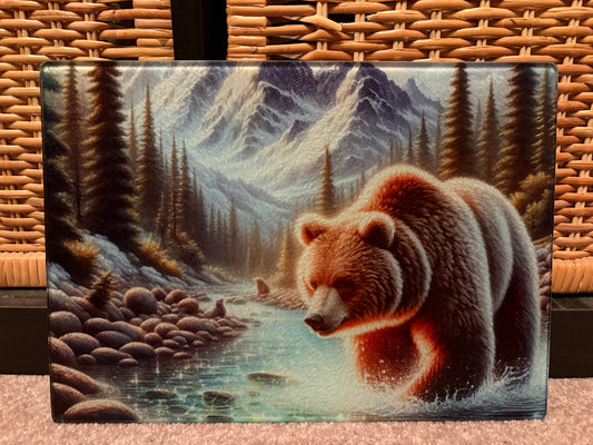Bear in the river with mountains