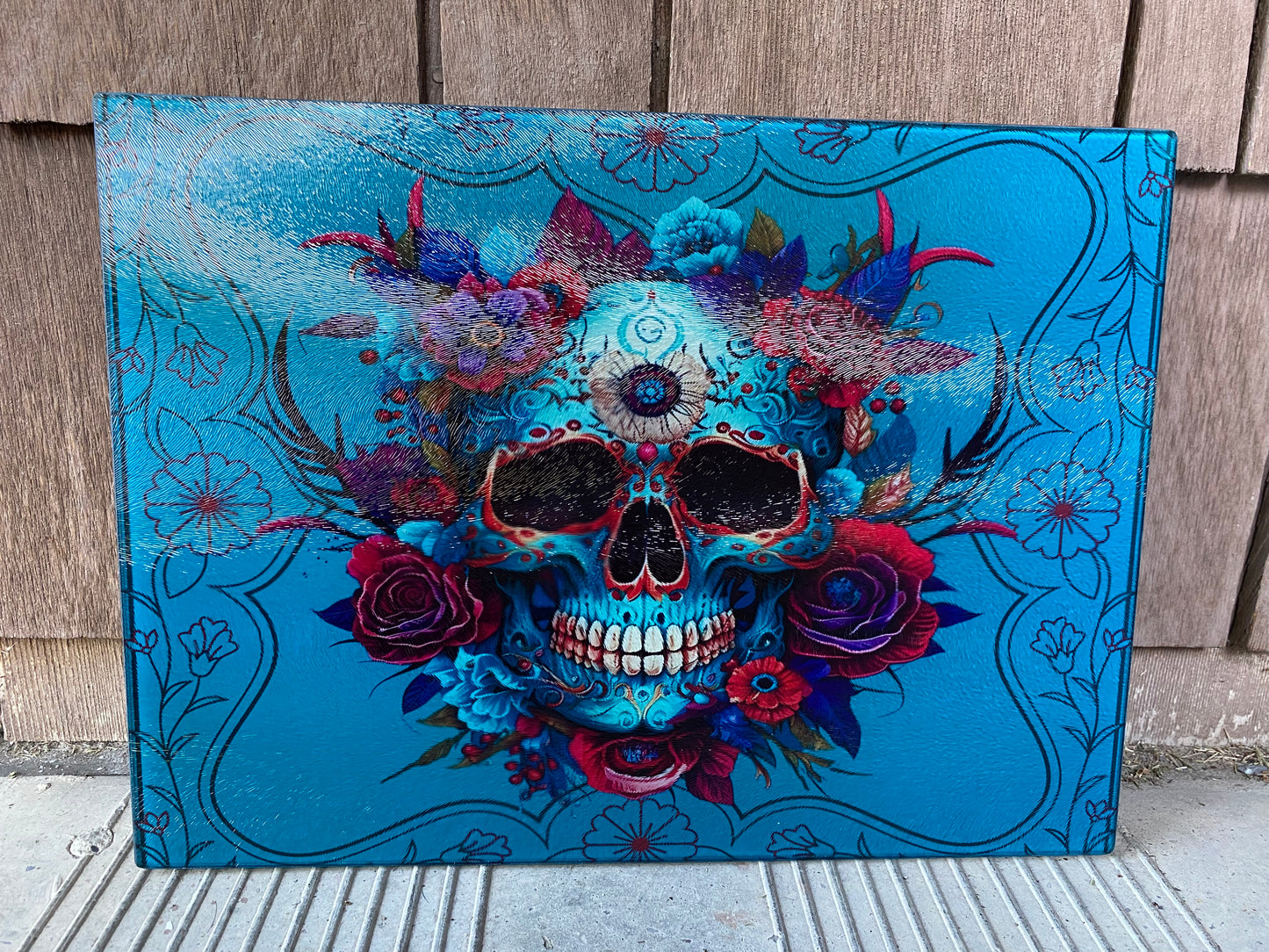 Sugar skull teal cutting board