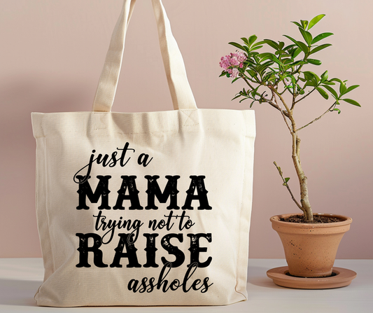 Just a mom tryin not to raise assholes Tote Bag